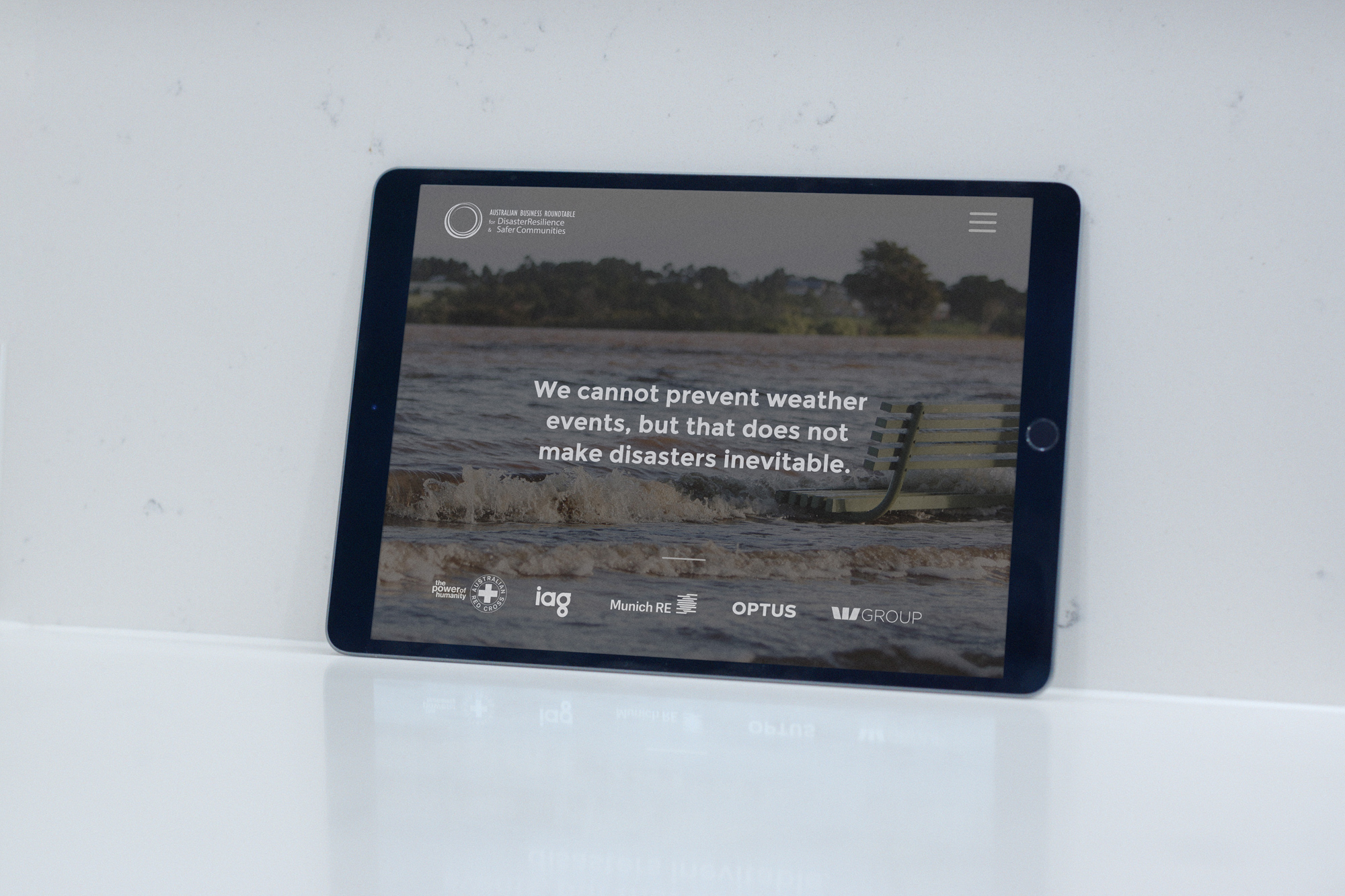 Image showing iPad with the home page of the website opened